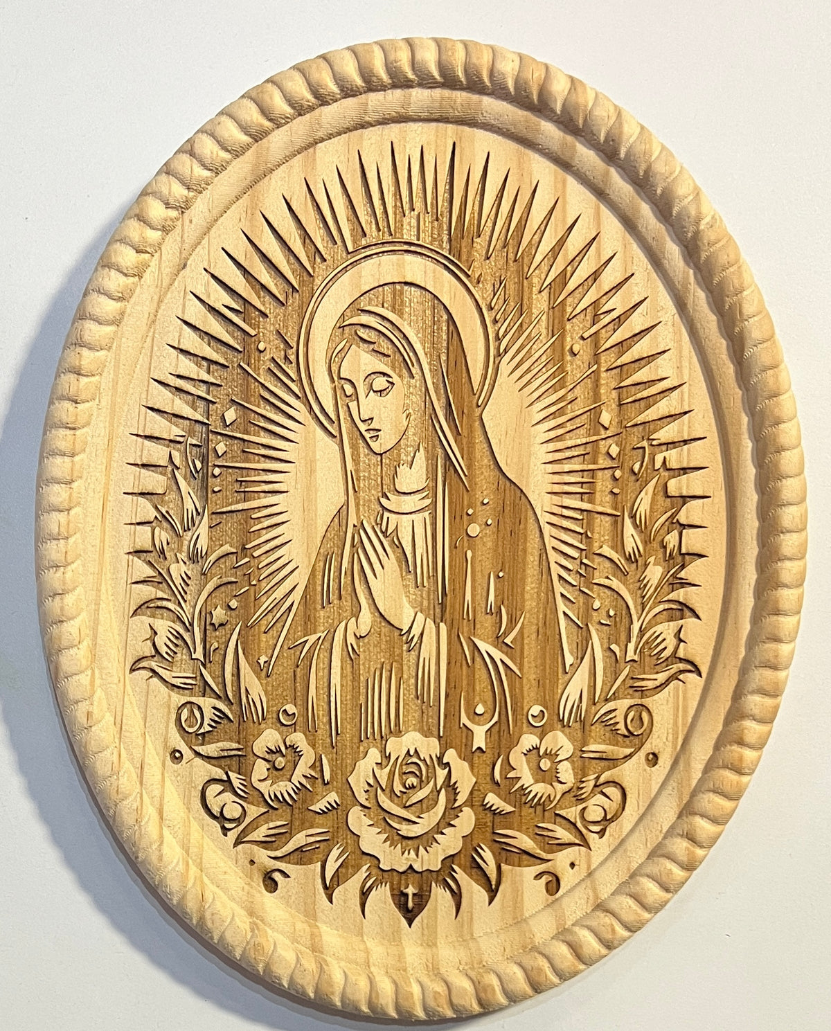 An oval shaped wood engraved Virgin Mary Plaque great for a gift for anyone who loves the Virgin Mary Trendie Days