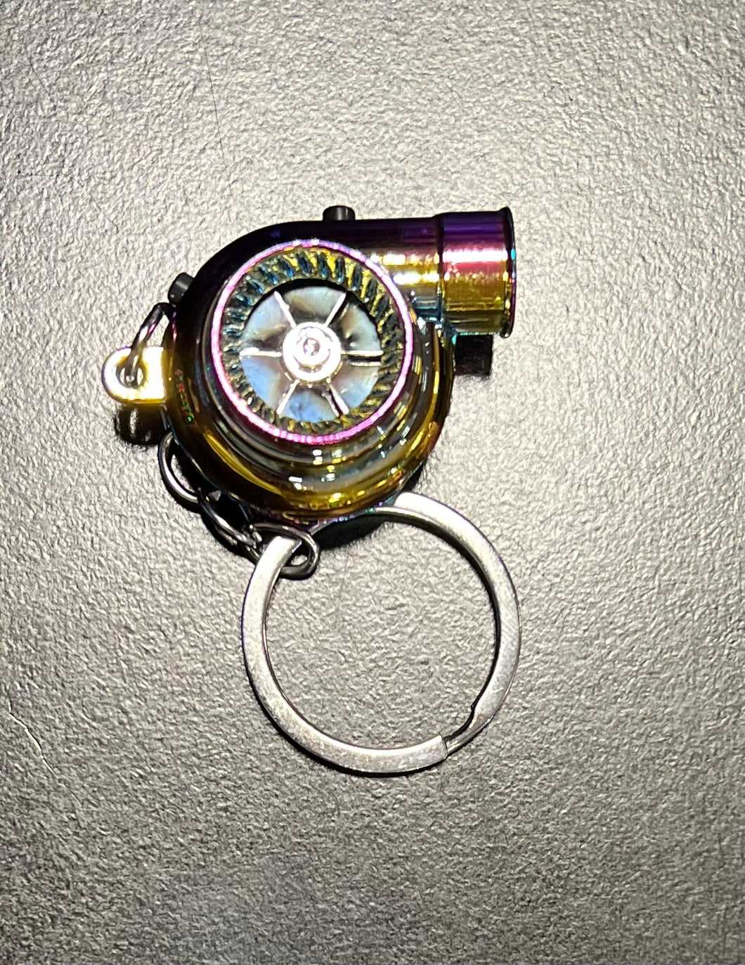 Oil slick rainbow rechargeable turbo keychain